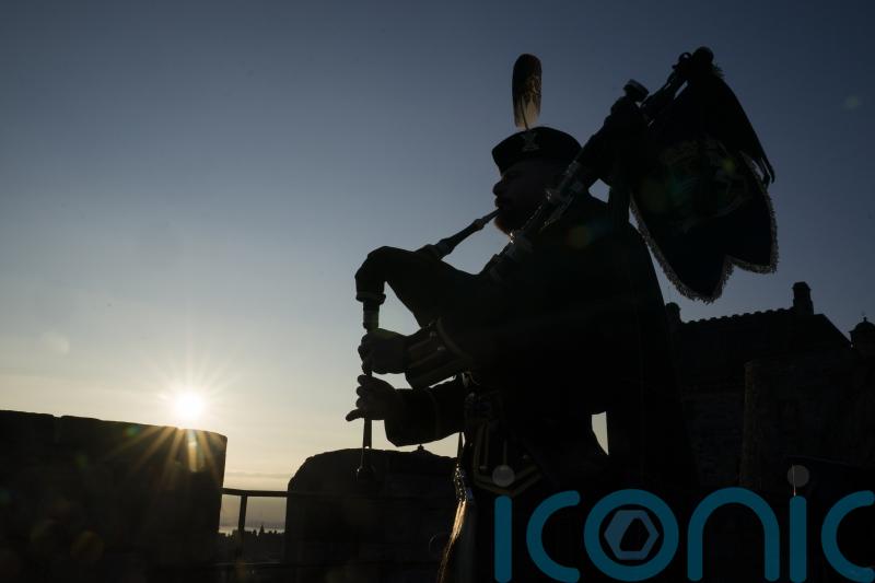 Lone piper plays at Edinburgh Castle to mark 80th anniversary of VJ Day