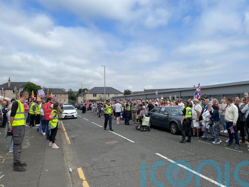 Anti-racism demonstrators stage counter-protest outside asylum seekers hotel