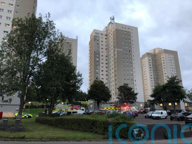 Man charged over tower block disturbance
