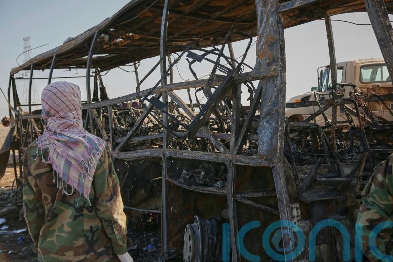 Bus crash in Afghanistan kills more than 70 people returning from Iran