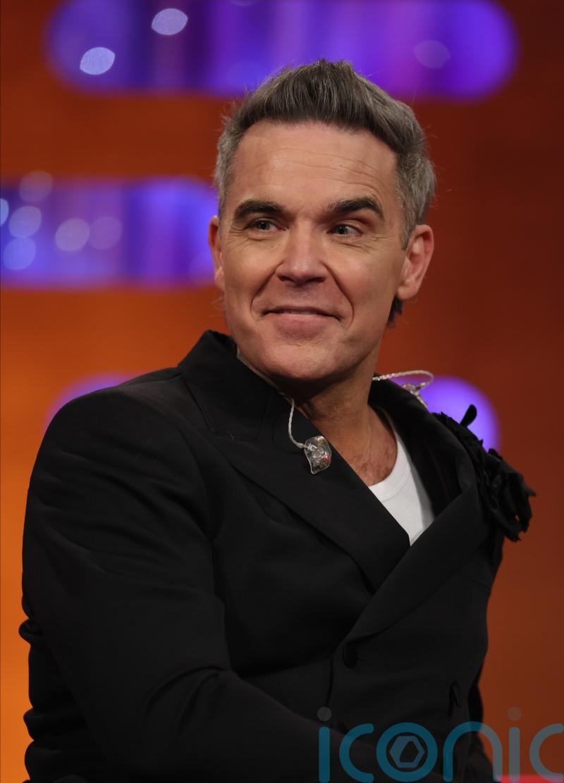 Robbie Williams says he would open for Oasis despite decades-long rivalry
