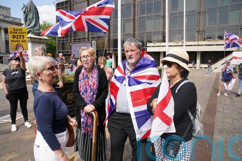 Anti-immigrant protesters face off with counter-demonstrators in Portsmouth