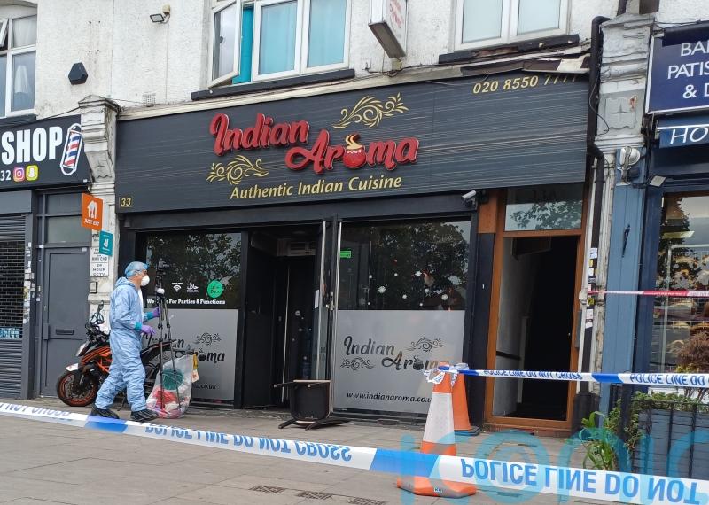 Boy, 15, and 54-year-old man arrested after fire at Ilford restaurant
