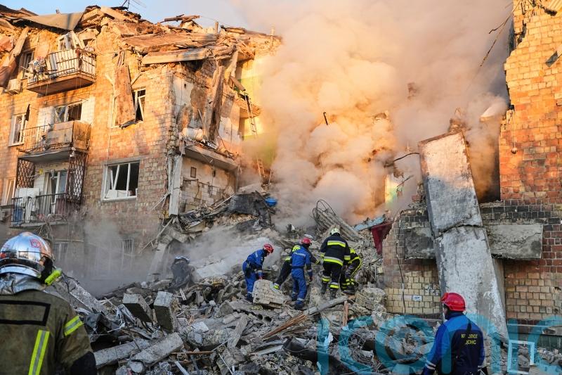 Peace efforts in limbo as Ukraine’s capital mourns 23 dead after Russian attack
