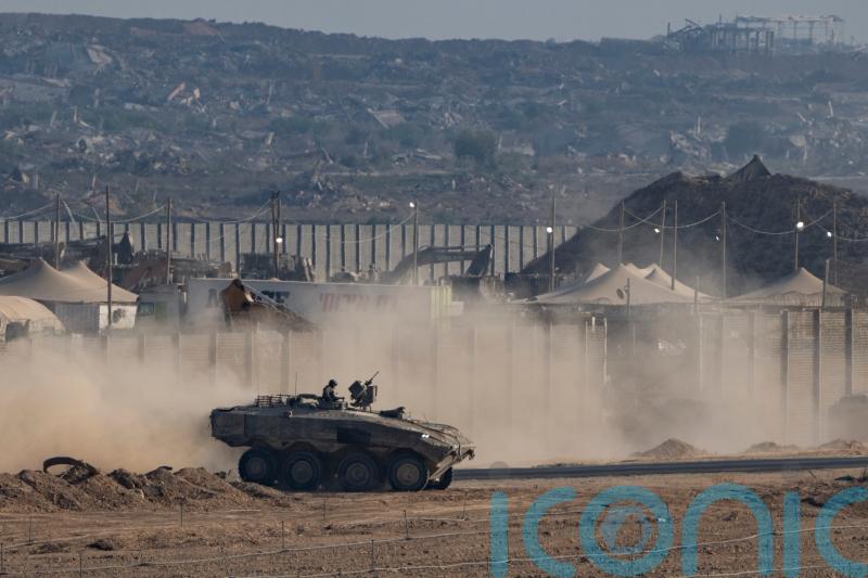 Strikes across Gaza kill at least 31 as scholars accuse Israel of genocide