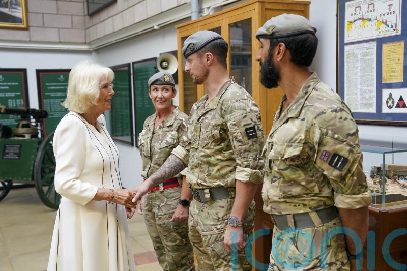 Queen presented with brooch to mark dedication to Army battalion