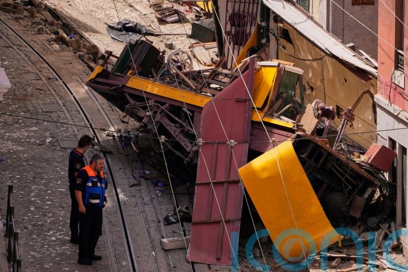 Investigators search for cause of Lisbon funicular crash that killed 16
