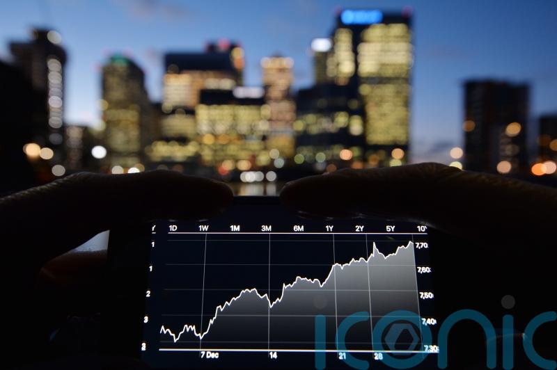 FTSE 100 closes higher as gold and oil climb