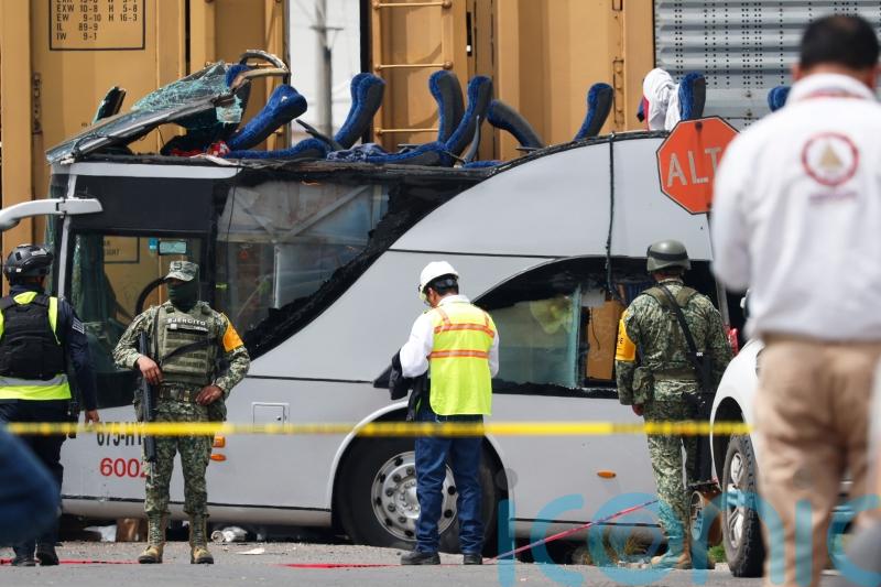 Train slams into bus in Mexico killing at least eight people