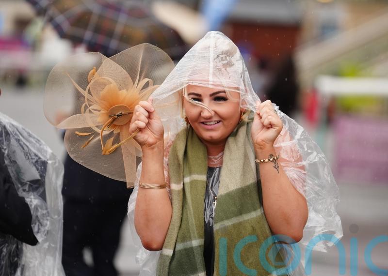 Gusts reach nearly 80mph as warning remains in place across England and Wales