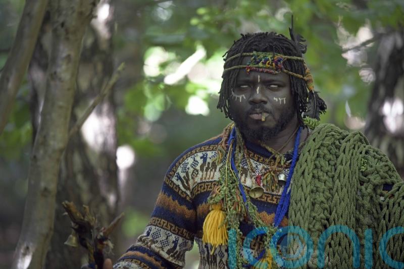 ‘African tribe’ camping in Scottish woods stays put despite council’s deadline