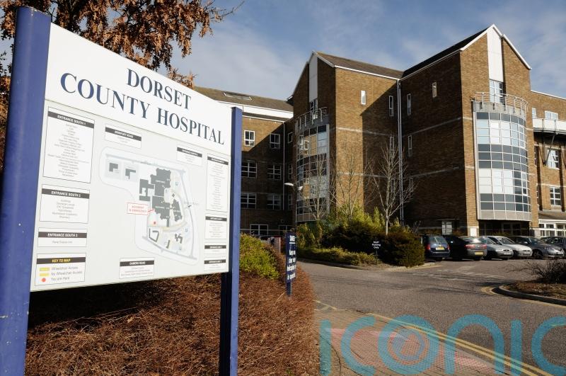 Health workers vote to strike over plan to move staff to new company