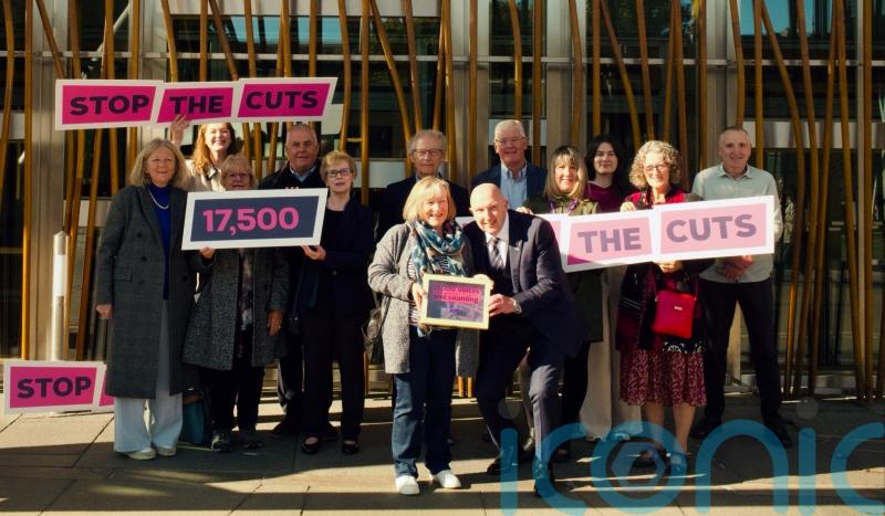 Campaigners deliver 17,500-name petition to stop cuts to dementia care