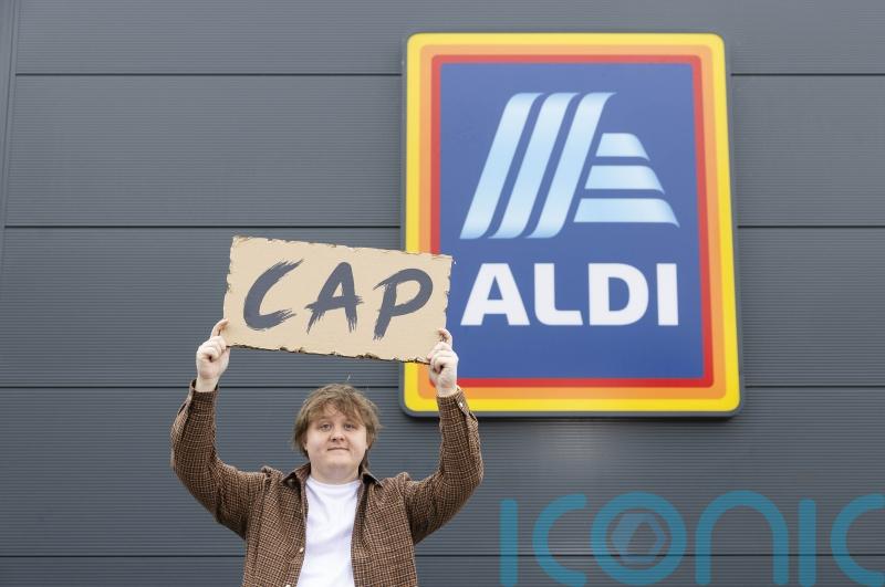 Lewis Cap-Aldi surprises shoppers with gig on supermarket roof