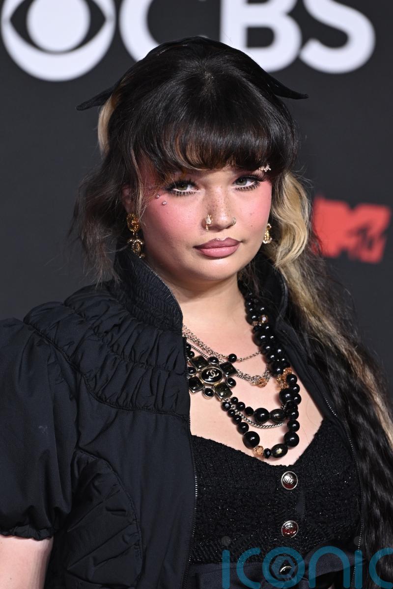 Singer Lola Young says she is ‘doing OK’ after collapsing on stage