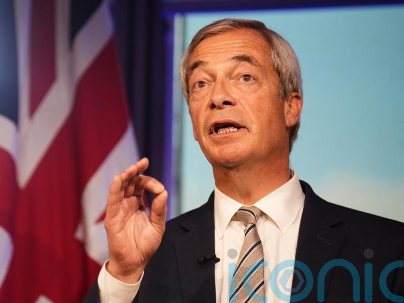 Farage says PM’s branding of Reform immigration policy as racist is a ‘disgrace’