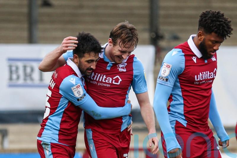 Scunthorpe see off York to keep pressure on at the top