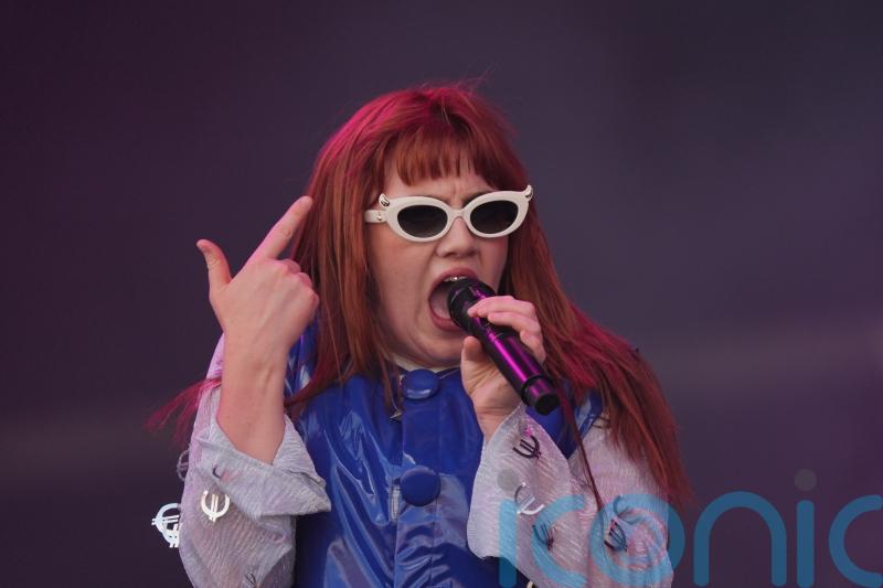 Irish singer CMAT postpones UK tour because of infected wisdom tooth