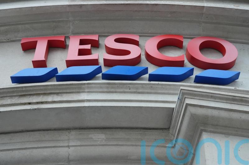 Tesco lifts profit outlook after lowered prices boosts trading