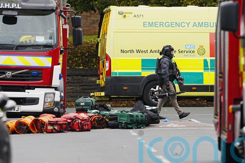 Two dead and suspect fatally shot after suspected terror attack at synagogue