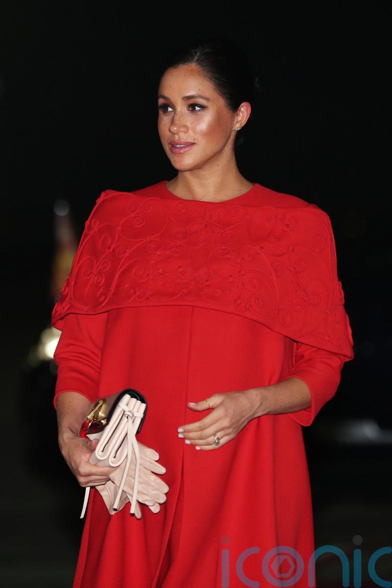 Duchess of Sussex attends Paris show of fashion designer Pierpaolo Piccioli
