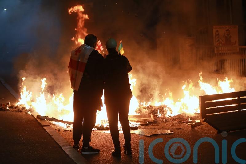 Georgia’s prime minister claims protesters want to topple his government