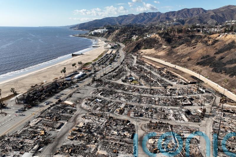 Authorities charge man over deadly wildfire that levelled LA neighbourhoods