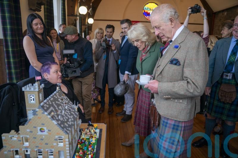 King and Queen receive Lego figures as they meet ‘good neighbours’