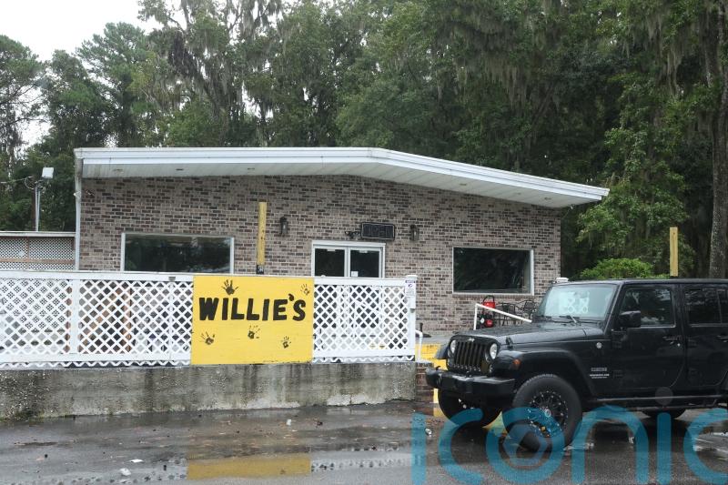 Four killed and 20 injured in mass shooting at bar in US