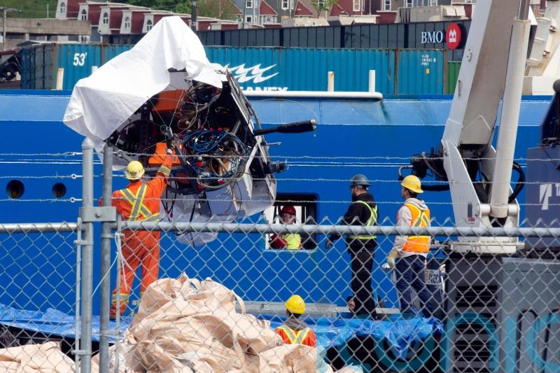 Faulty engineering led to implosion of submersible headed to Titanic – report