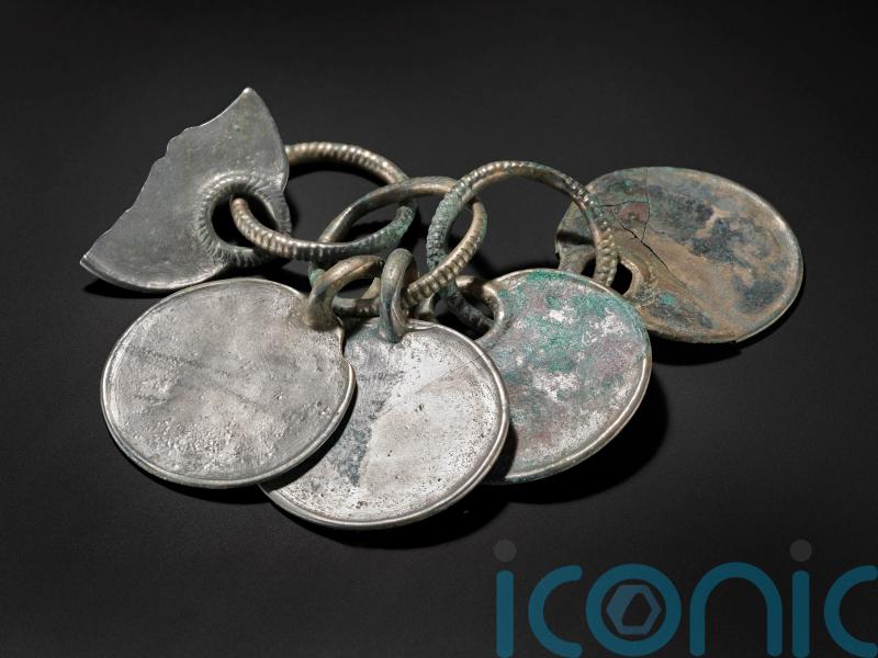 Museum staff describe ‘magical’ moment hoard’s silver colour was revealed