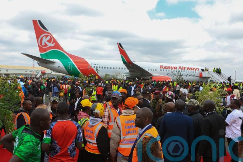 Kenyan police fire at mourners as violence erupts at viewing of body of ex-PM