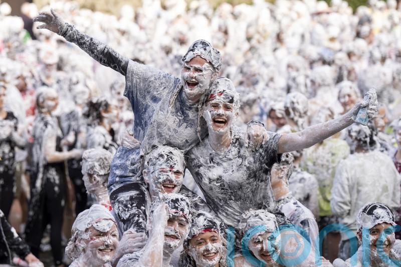 Students let loose with shaving foam for Raisin Monday in St Andrews