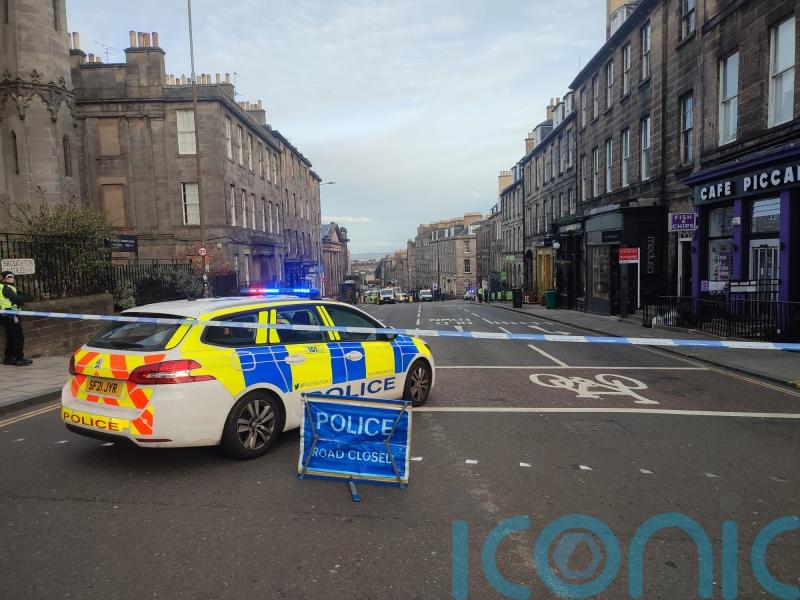 Two marked police vehicles involved in four-vehicle crash