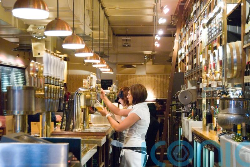 Share of low-paid workers in UK hits record low while gender pay gap narrows