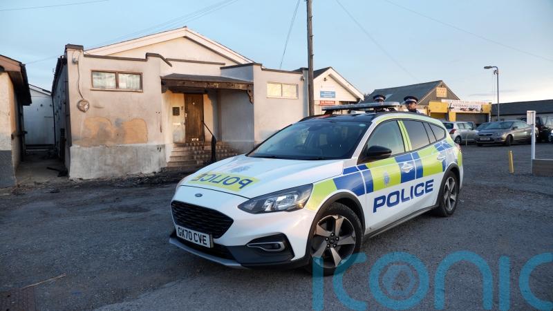 Two men charged with arson over attack on mosque remanded in custody