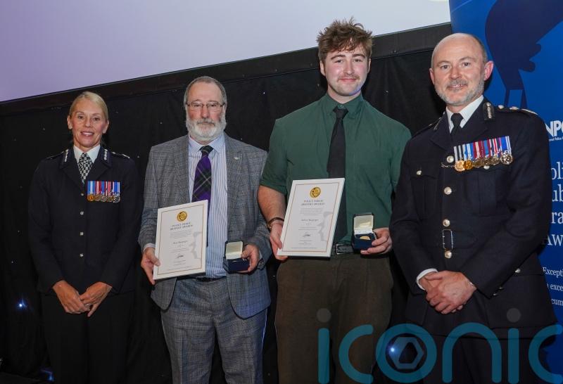 Father and son honoured for saving two children from burning building