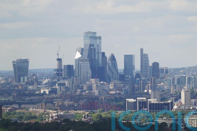FTSE 100 hits record high after optimistic UK economic reports