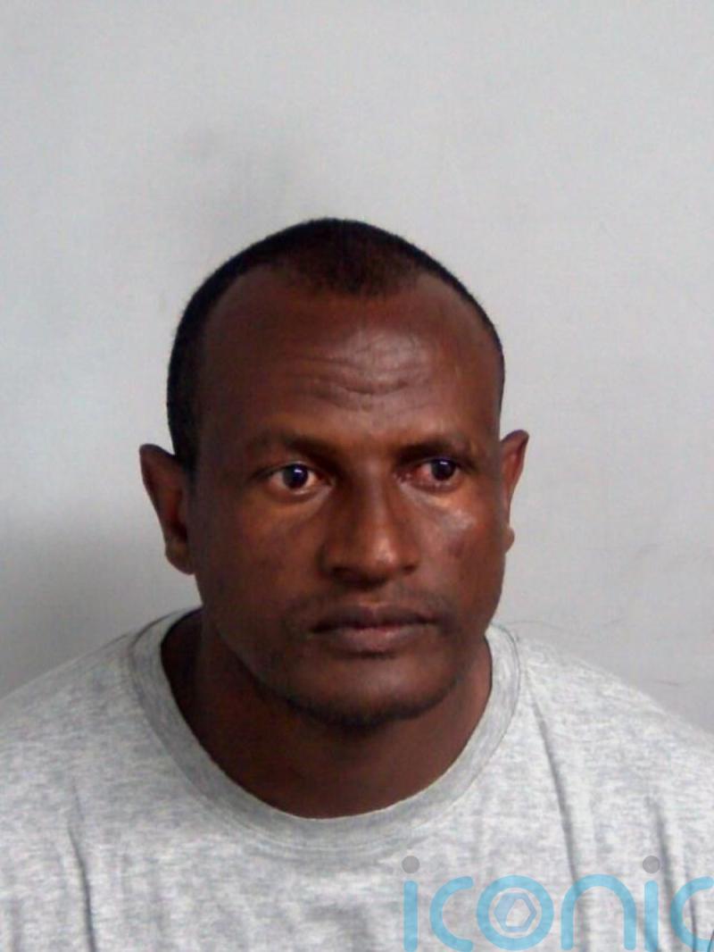 Asylum seeker freed in error from prison seen taking train to London