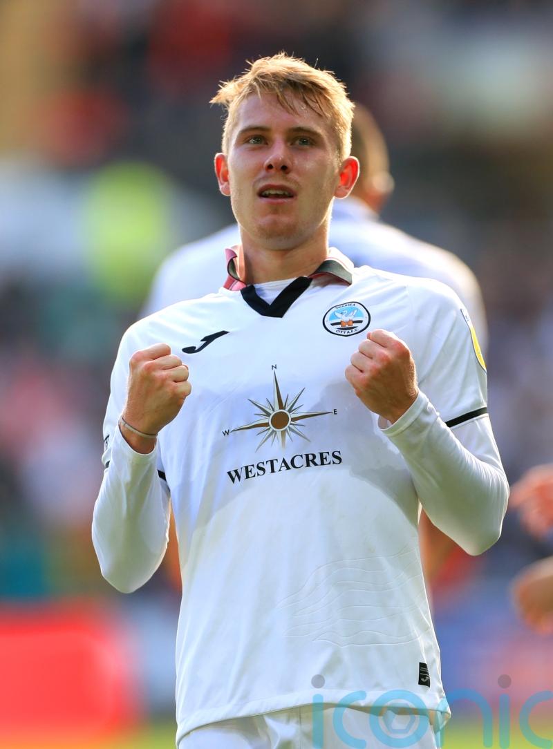 Ollie Cooper’s first Wigan goal earns point at Mansfield