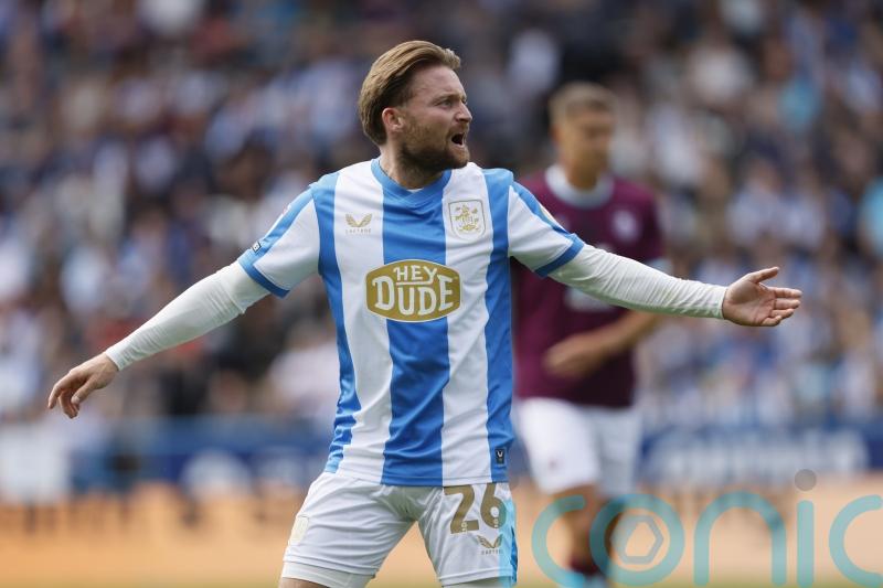 Wycombe make the most of Alfie May’s red card to see off Huddersfield