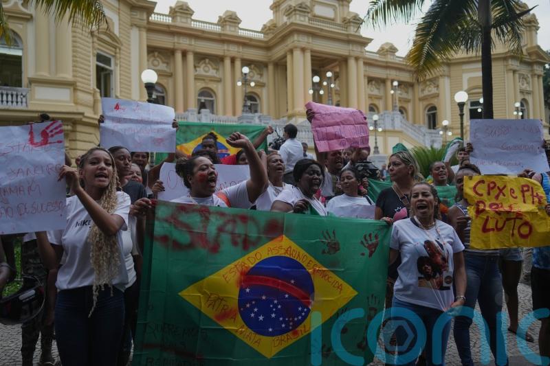 Protests after police raid leaves at least 121 dead in two Rio slums