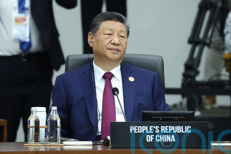 China’s Xi promises to protect free trade at Apec as Trump snubs major summit