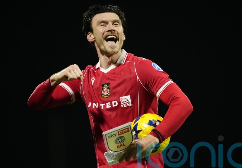 Wrexham’s Kieffer Moore says ‘nice sleep’ means he is not snoozing up front