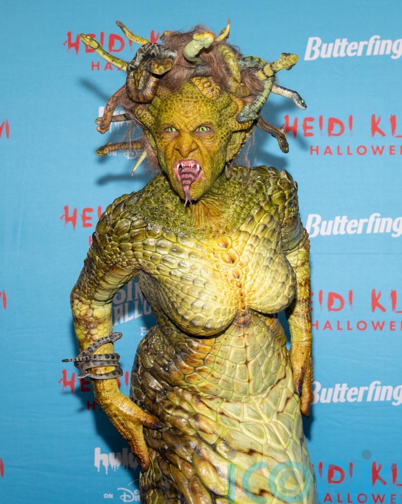 Heidi Klum dresses as Medusa at annual Halloween party