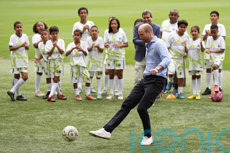 Prince of Wales celebrates penalty at world famous Maracana stadium