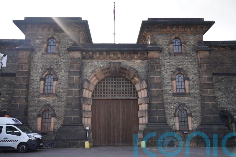 One of four prisoners at large is now back in custody