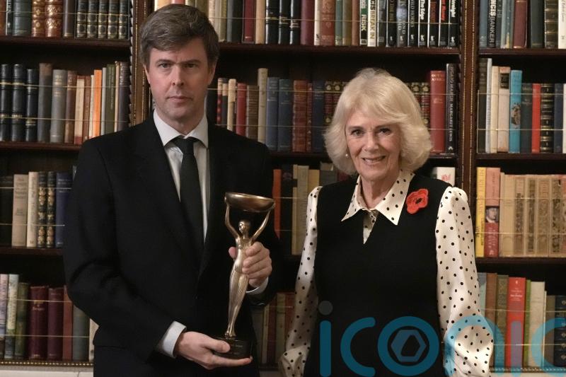 Queen welcomes Booker Prize-winning author at Clarence House