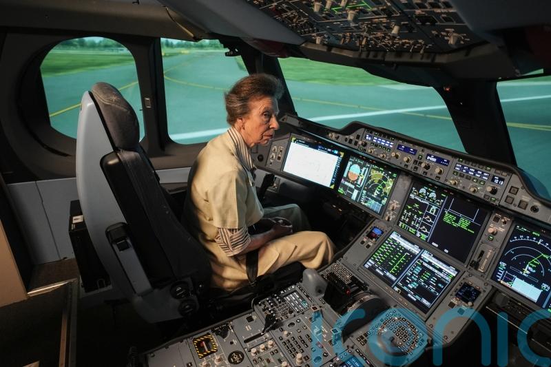 Anne straps into pilot’s seat to test Airbus flight simulator in Singapore