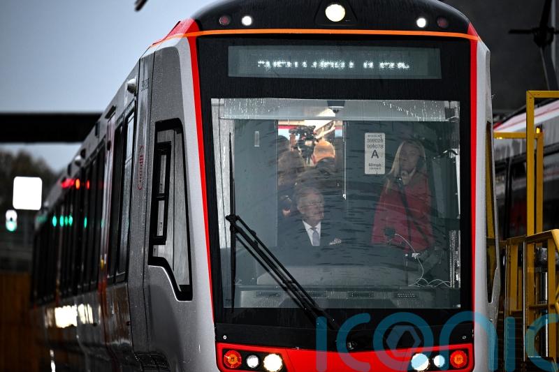 King drives tram-train as part of his birthday celebrations